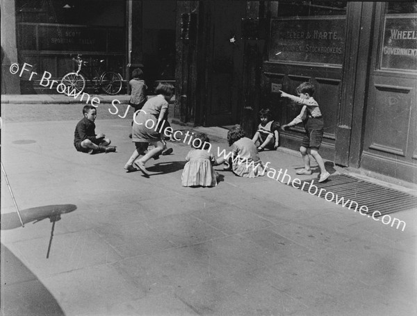 CHLIDREN PLAYING  MARLBOROUGH STREET